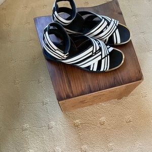 Ferraragamo size 7 1/2m black and white leather sandals.